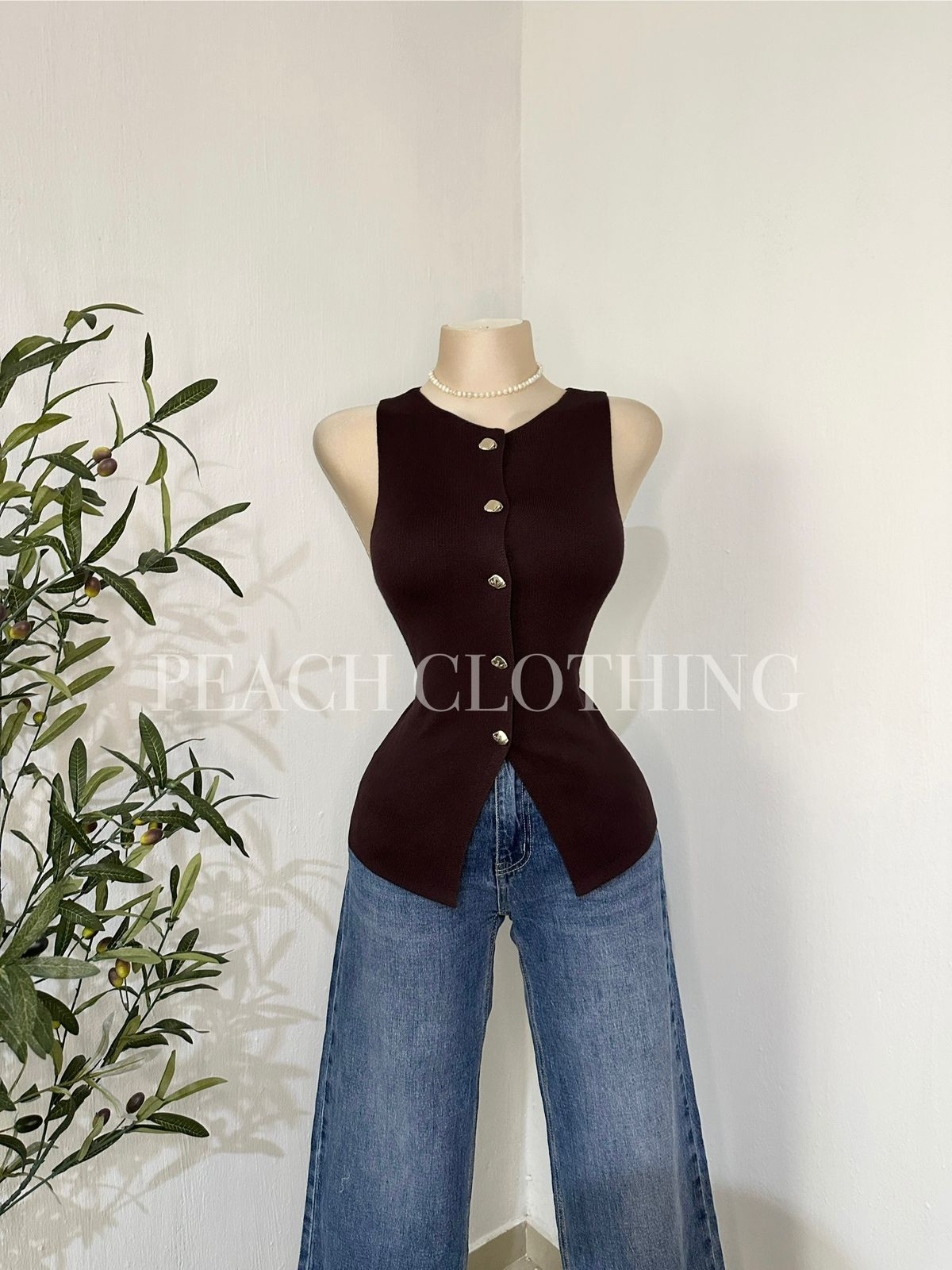 Chaleco botones dorados