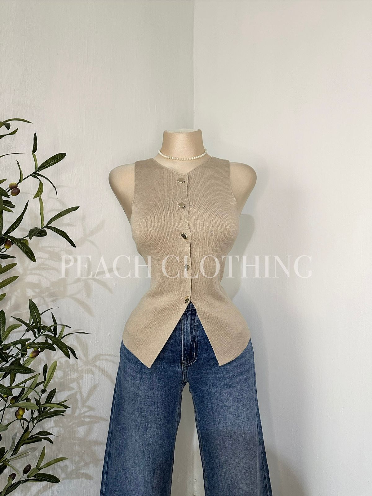 Chaleco botones dorados