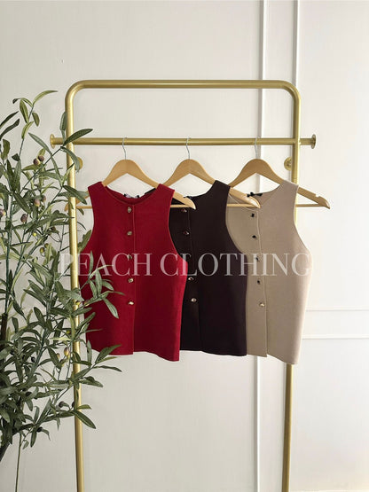 Chaleco botones dorados