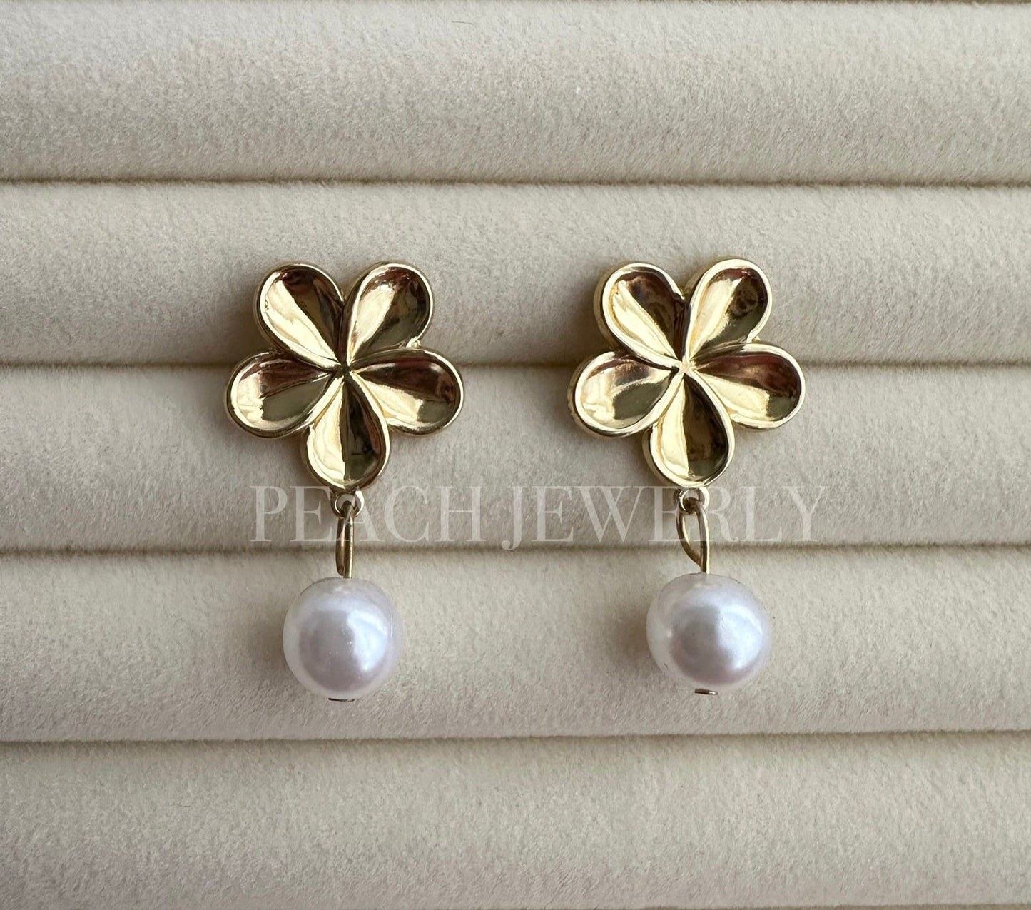 Aretes flor con perla